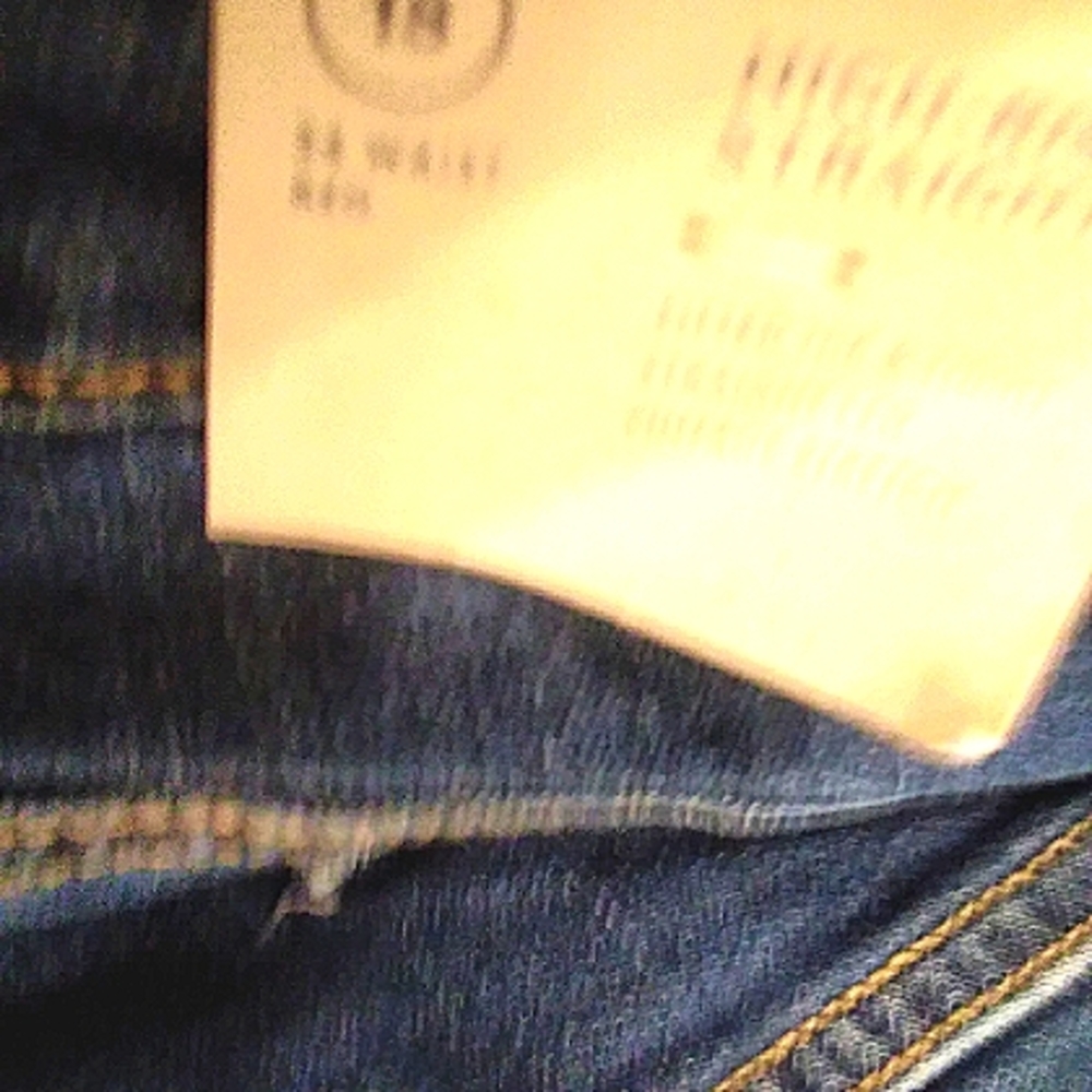 2 shirts one pair jeans one pair of black slacks